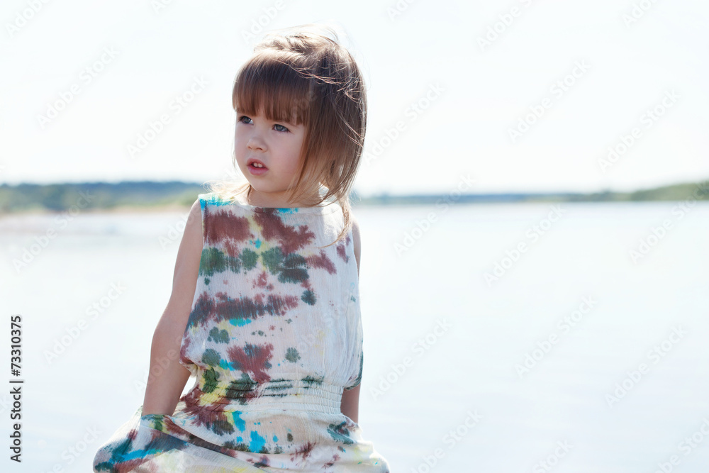 Image of pretty little model posing at lake Image of pretty little model posing at lake