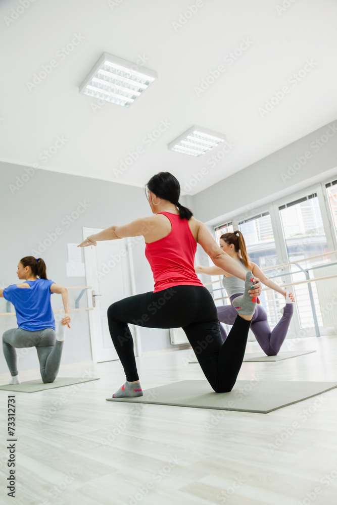 Obraz premium Females Doing Yoga