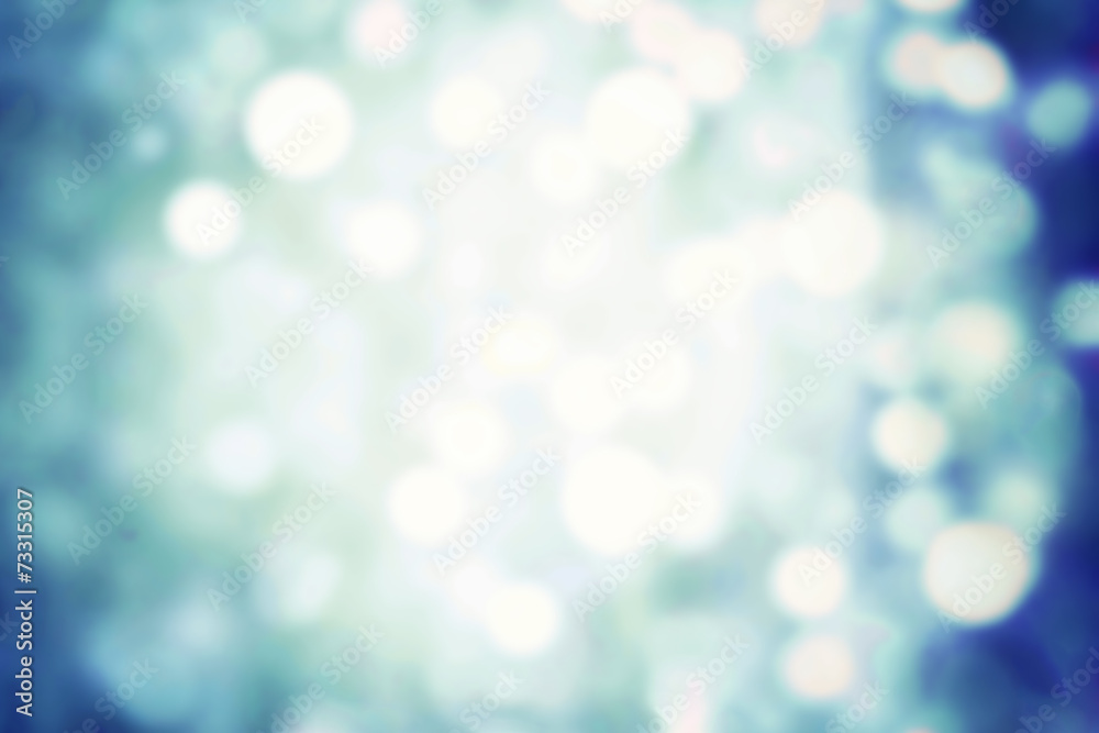 Winter background with blurry bokeh special magic effect. Glitte