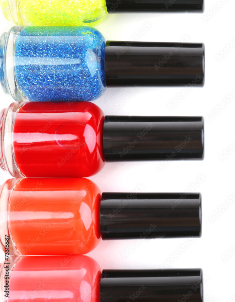 Colorful nail polishes isolated on white Colorful nail polishes isolated on white