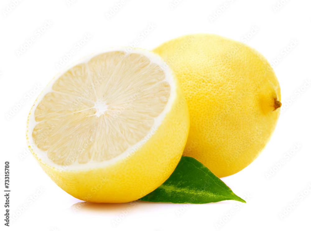 Ripe lemon with leaf.