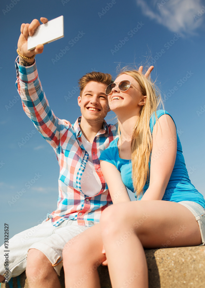 smiling couple having fun outdoors
