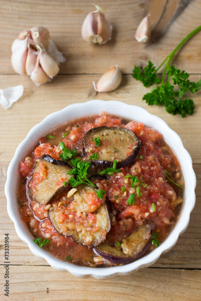 Roasted eggplant pieces with spicy raw tomato dip Roasted eggplant pieces with spicy raw tomato dip