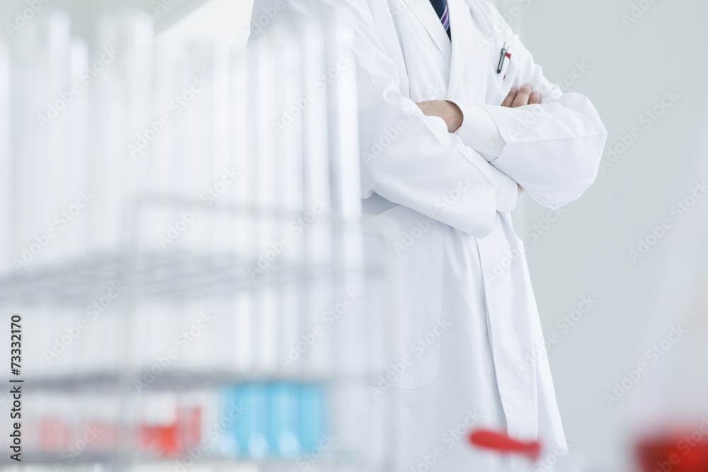 Men arm in arm wearing a white coat Men arm in arm wearing a white coat