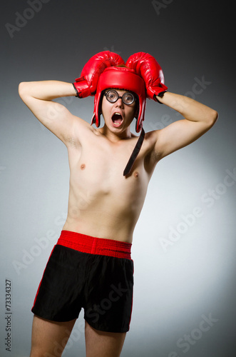 Funny boxer against dark background © Elnur
