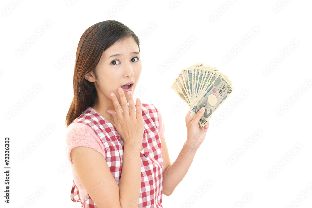 札束を持つ主婦 札束を持つ主婦