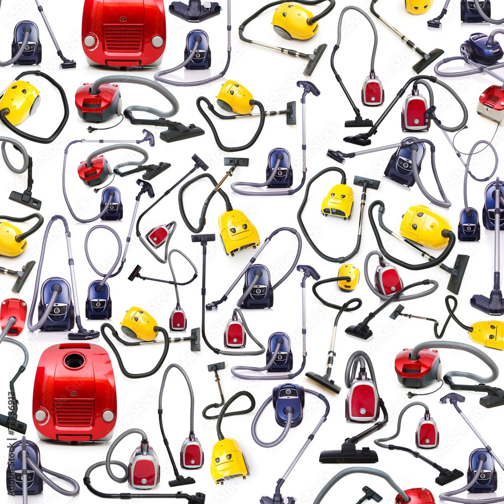Background made of many vacuum cleaners on white