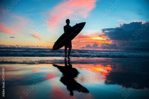 Surfer with board