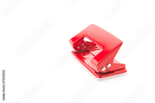 Red office punch isolated on white background