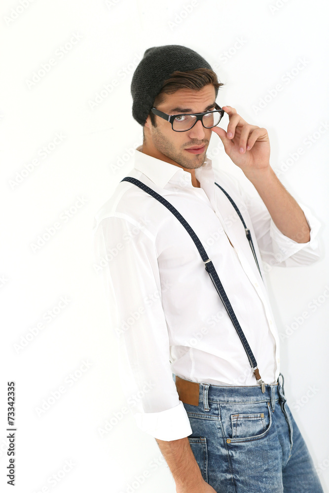 Trendy guy with suspenders and eyeglasses, isolated Trendy guy with suspenders and eyeglasses, isolated