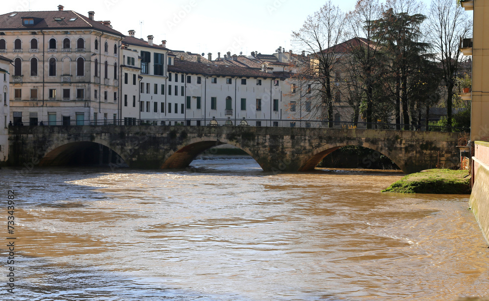pusterla bridge with bacchiglione river in the vicenza city in i