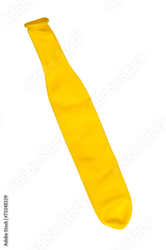 Photos Yellow deflated balloon over white