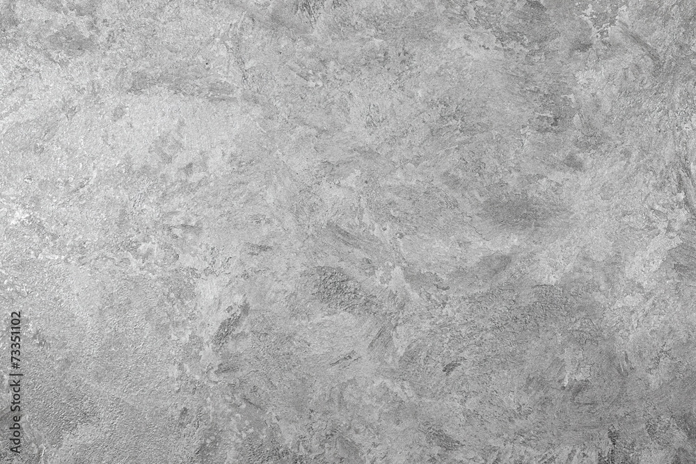 Naklejka premium Grungy gray background of decorative stucco