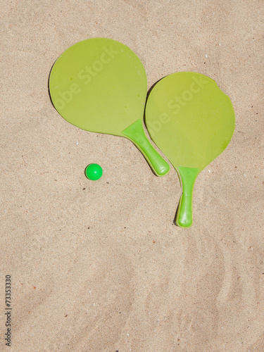 beach racket ball game photo