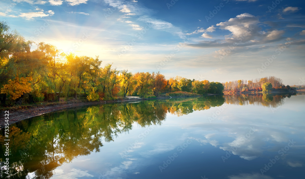 Morning sun over lake