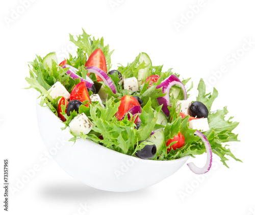 Fresh tasty salad over white
