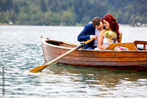 Young wedding couple kissing