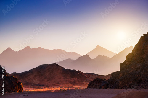 Fantastic landscape with mountains at sunset