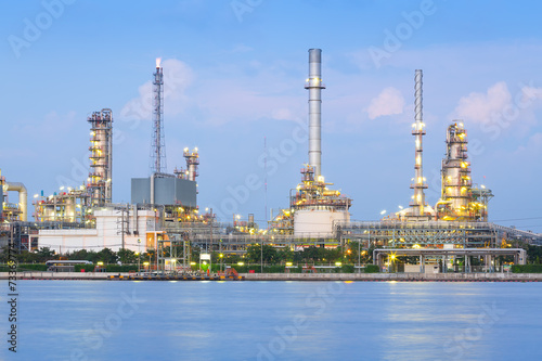 Oil gas refinery plant. May called petroleum, production or petrochemical plant. Industrial factory construction from engineering technology with steel pipe, pipeline, tank. Business for power energy.