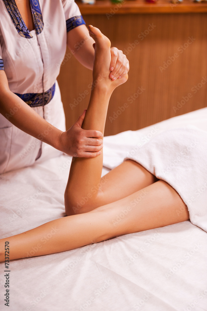 Obraz premium Massaging legs.