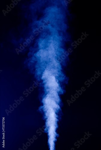 Blue vapor on the black background
