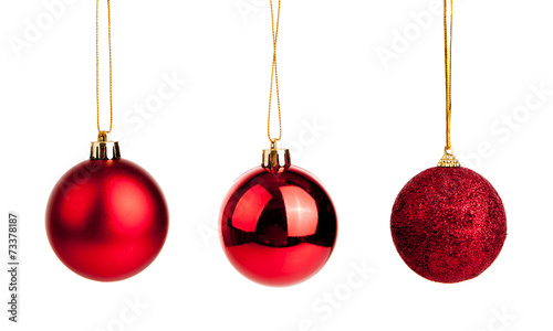Three of red christmas tree baubles