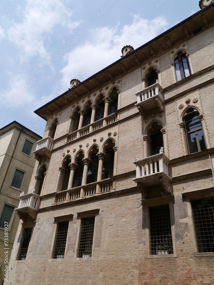 A historic palace with balconies in Vicenza in Italy