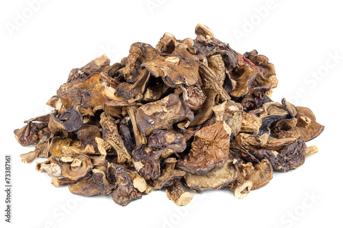 Heap of dried mushrooms on white background