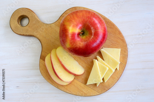 Apple on apple shaped board
