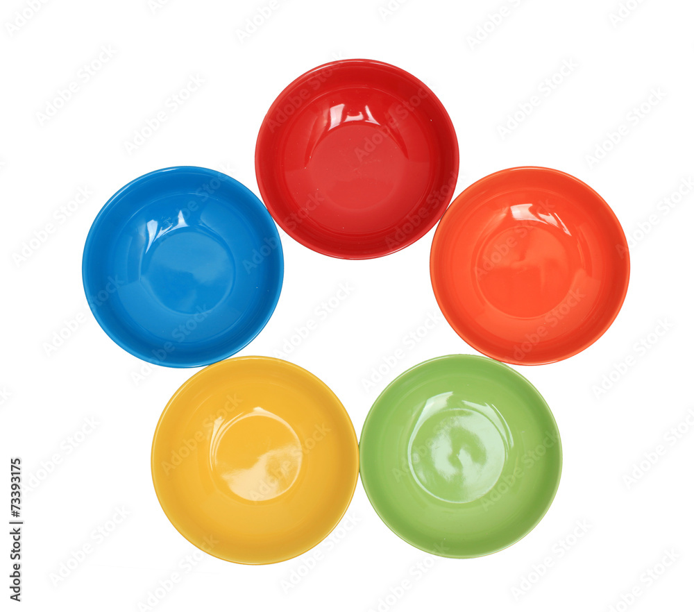 Row with five colorful bowls isolated over white Row with five colorful bowls isolated over white