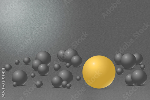 Ball with one gold ball and metal background