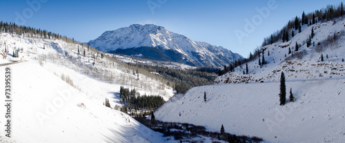 winter road to the mountain, colorado 