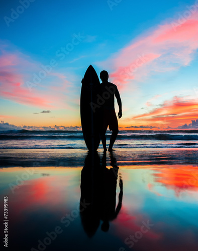 Surfer with board