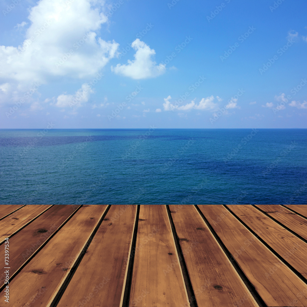 Ocean with sky and wood floor