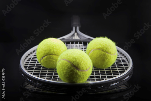 A set of tennis. Racket and ball. © BrunoWeltmann