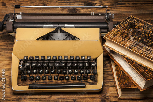 old typewriter, a pile of books and a lot of creativity