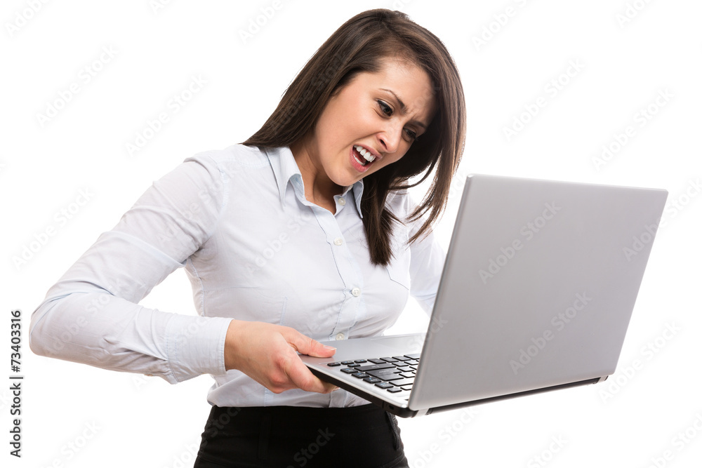 Furious young businesswoman with notebook Furious young businesswoman with notebook