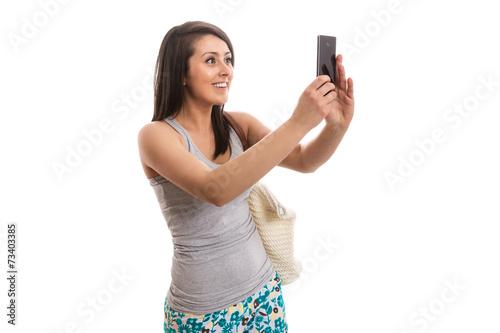 Young beautiful woman taking selfie