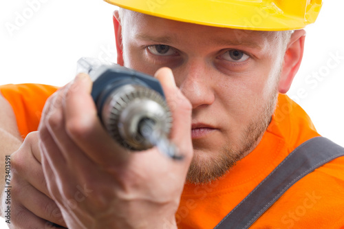 Construction worker with drill photo