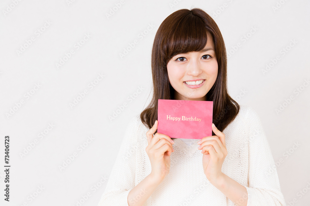 young asian woman with gift on white background young asian woman with gift on white background