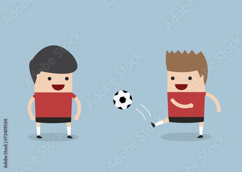 Two men playing soccer or football