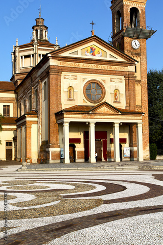 in  the parabiago old   church  closed brick tower sidewalk ital photo