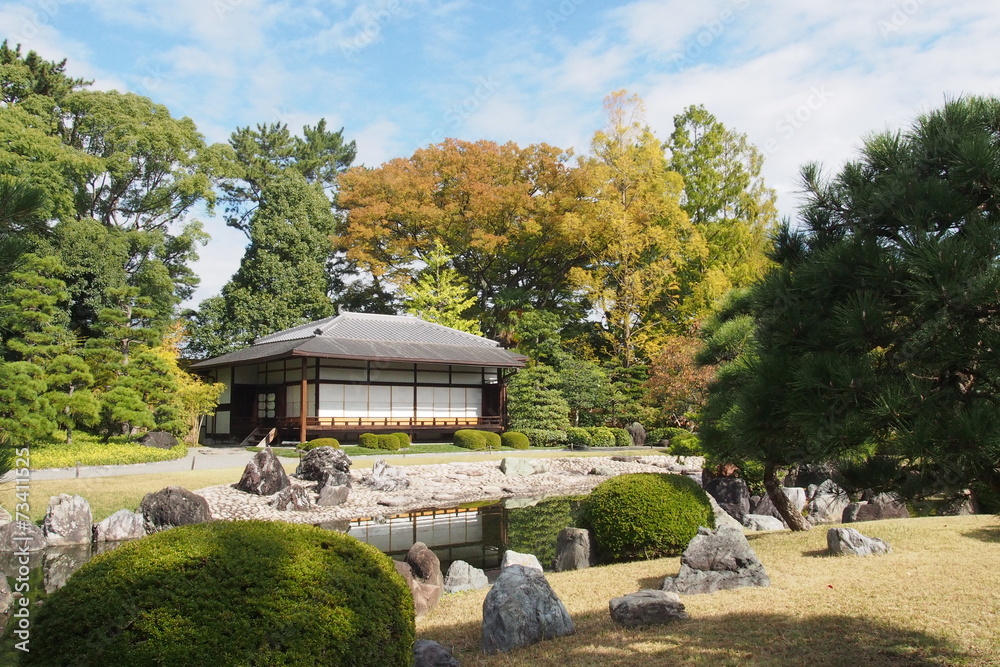 Traditional Japanese pavilion in autumn garden