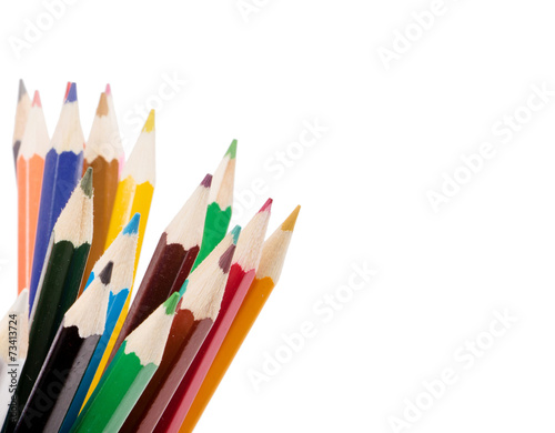 Drawing supplies: assorted color pencils, isolated on white back