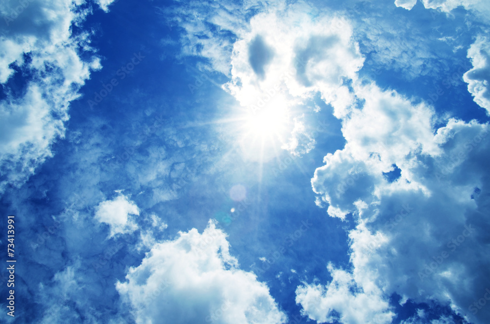 Blue sky with clouds and sun. Blue sky with clouds and sun.