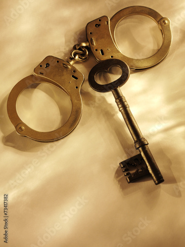 Police Handcuffs and an Old Church Key
