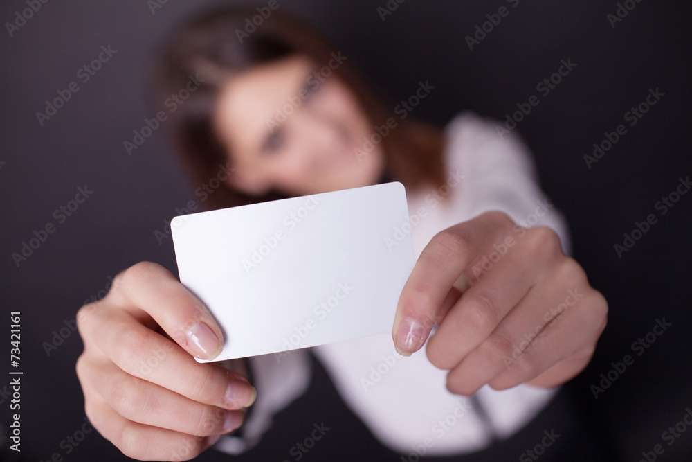 Gift card. Excited woman showing empty blank paper card sign wit Gift card. Excited woman showing empty blank paper card sign wit