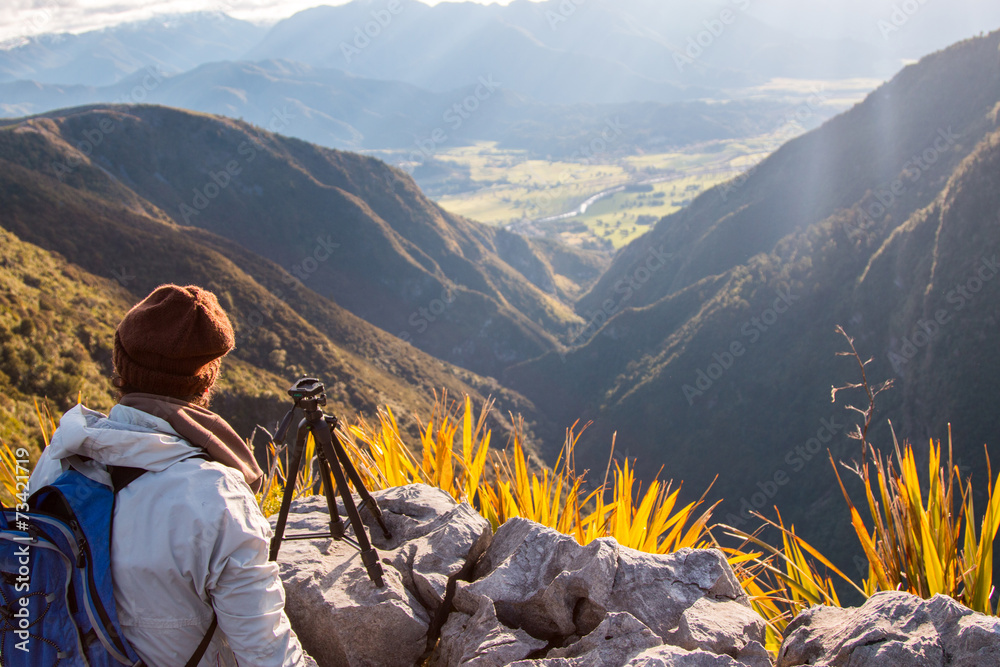 photographer at the top of the mountain.