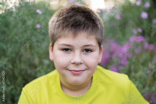 Portrait of a boy teen outdoors