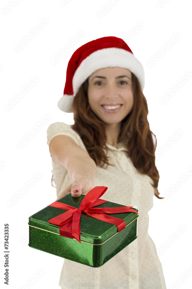 Happy christmas woman giving a gift with the focus on the box Happy christmas woman giving a gift with the focus on the box